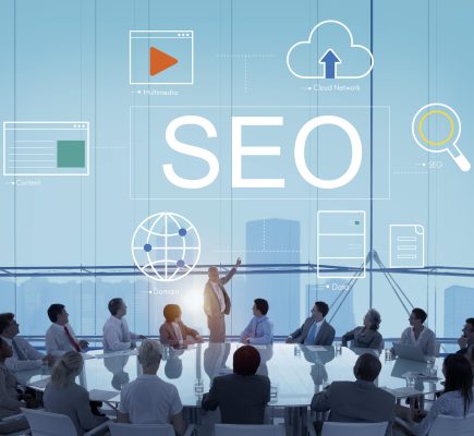 Business professionals in SEO strategy meeting in blog image, discussing website optimisation techniques, search engine marketing planning, and digital visibility enhancement by Craze For Marketing Sydney agency.